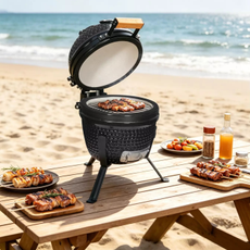 Habitat tabletop Kamado Egg BBQ on a bench on the beach.