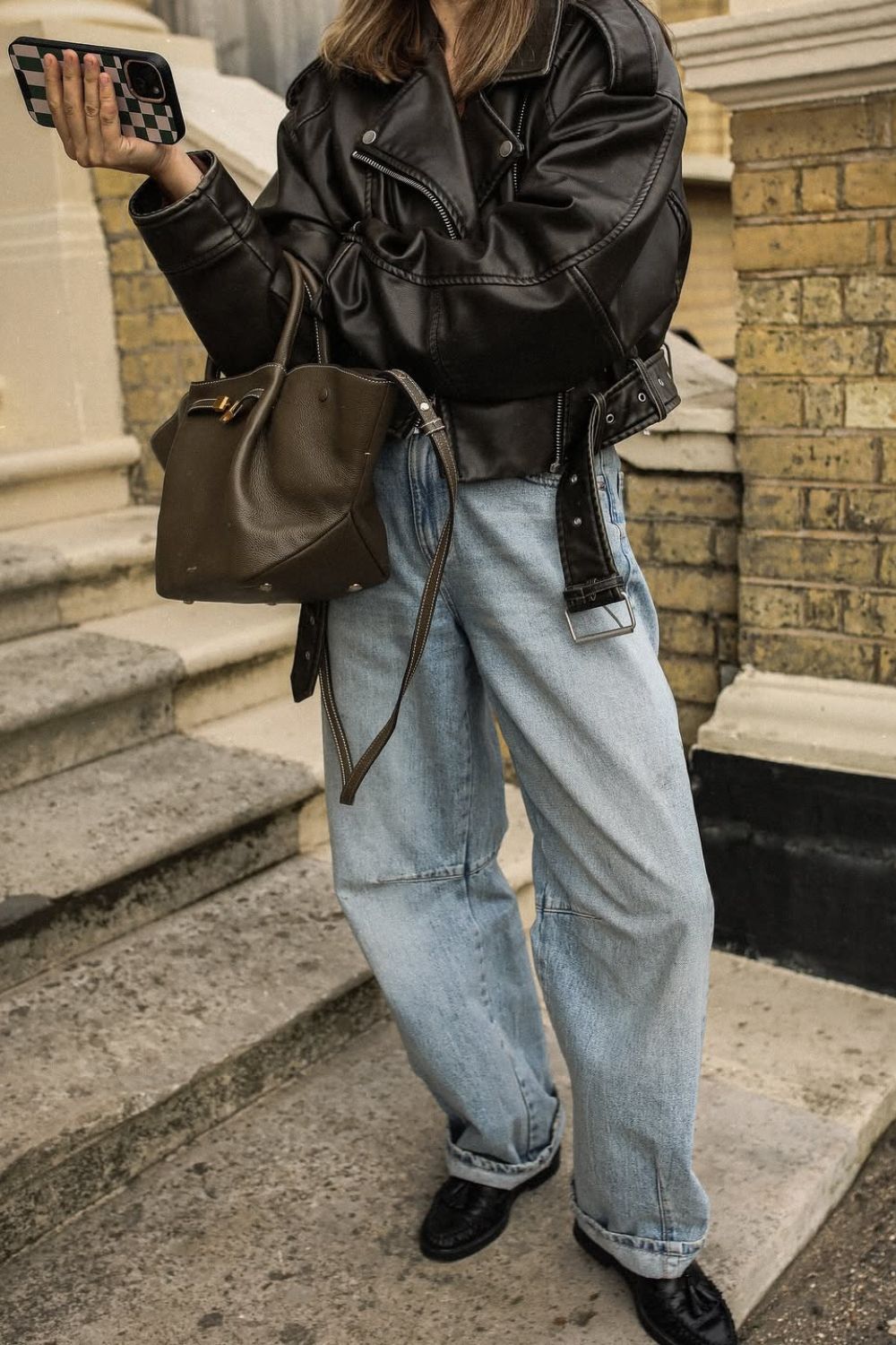 hannahcrosskey in a leather jacket