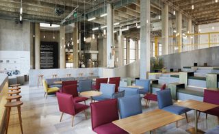 Pink and blue seating in restaurant