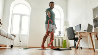 Man throws resistance bands on to the floor