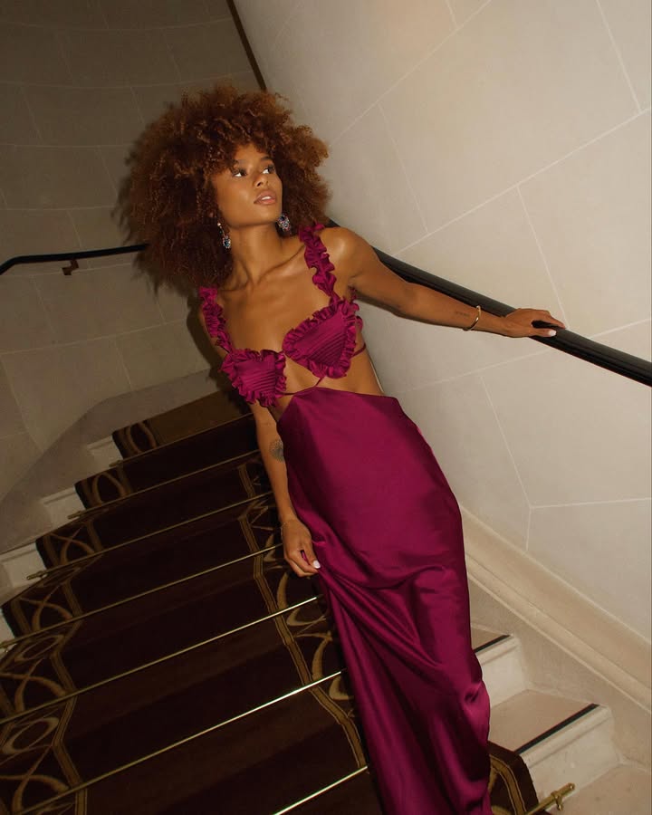 what to wear to a gala - woman wearing cutout burgundy outfit