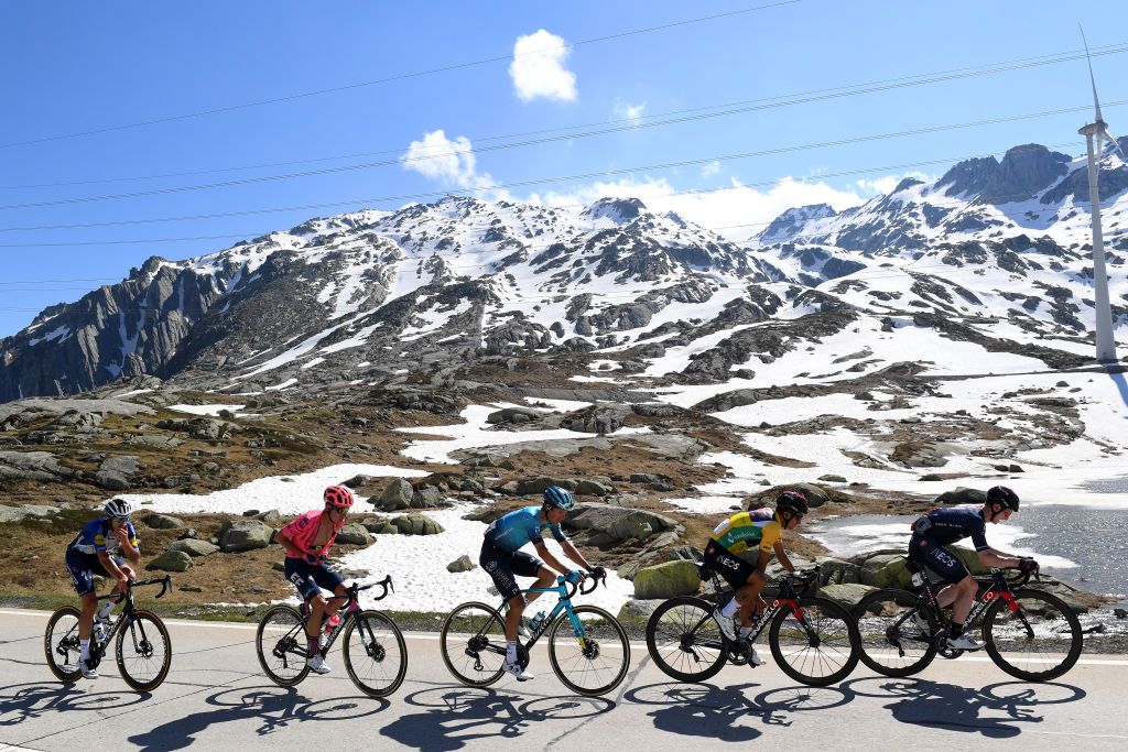 ANDERMATT SWITZERLAND JUNE 13 Mattia Cattaneo of Italy and Team Deceuninck QuickStep Rigoberto Uran Uran of Colombia and Team EF Education Nippo Jakob Fuglsang of Denmark and Team Astana Premier Tech Richard Carapaz of Ecuador and Team INEOS Grenadiers yellow leader jersey Eddie Dunbar of Ireland and Team INEOS Grenadiers in breakaway during the 84th Tour de Suisse 2021 Stage 8 a 1595km stage from Andermatt to Andermatt Gotthardpass 2106m Mountain Snow Landscape UCIworldtour tds tourdesuisse on June 13 2021 in Andermatt Switzerland Photo by Tim de WaeleGetty Images