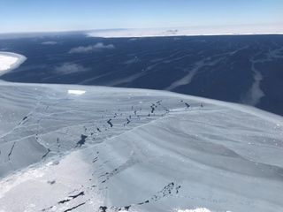 Looking out from the sea ice to iceberg A68, around November 2017, just months after the berg calved from Antarctica’s Larsen C Ice Shelf in July.