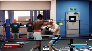 Undisputed boxers spar in a gym ring.