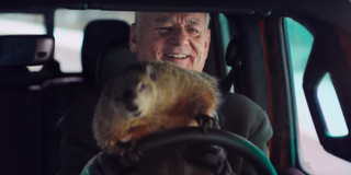 Bill Murray drives with a groundhog in his lap in Jeep's 2020 Super Bowl ad.