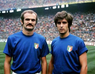Italy team-mates Sandro Mazzola (left) and Gianni Rivera pose for a photo in 1972.