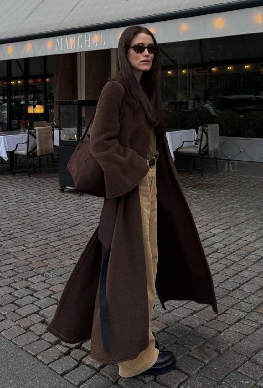 @annabelrosendahl wears camel jeans with a brown trench and bag