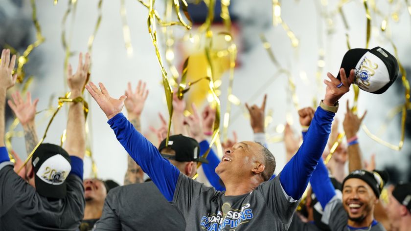 Los Angeles Dodgers Manager Dave Roberts celebrates World Series victory with his team in Fight for Glory: 2024 World Series