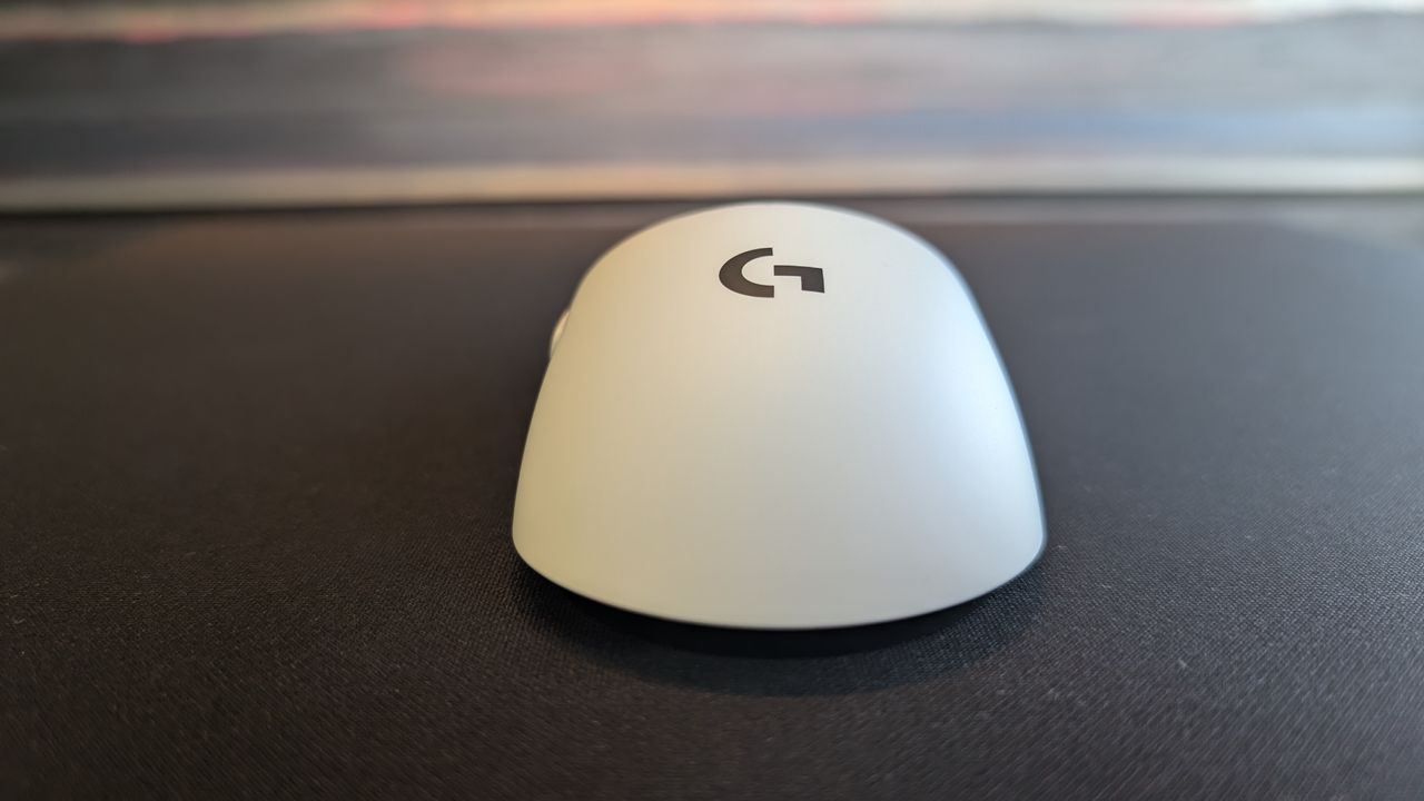 The Logitech G Pro X2 Superstrike pictured on a black mouse mat.