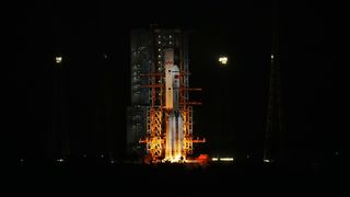 A Long March 7 rocket launches the Tianzhou 9 cargo mission to China's Tiangong space station on July 14, 2025.