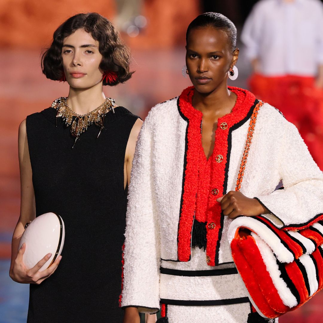 two models on the Chanel runway wearing Chanel spring 2026 looks