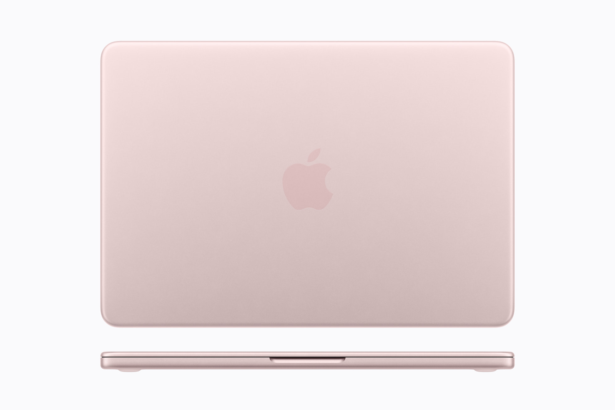 A top-down and front-edge view of a closed, metallic pink laptop featuring a centered Apple logo.