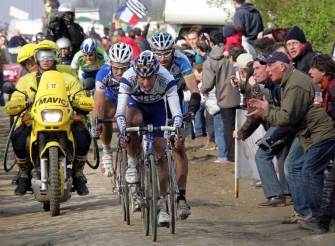 Juan Antonio Flecha pushes the pace in the 2005 Paris-Roubaix ahead of eventual winner Tom Boonen and runner-up George Hincapie. Flecha placed third that year and would finish on the Paris-Roubaix podium three times