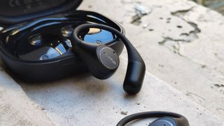 The Earfun OpenJump on a white ledge