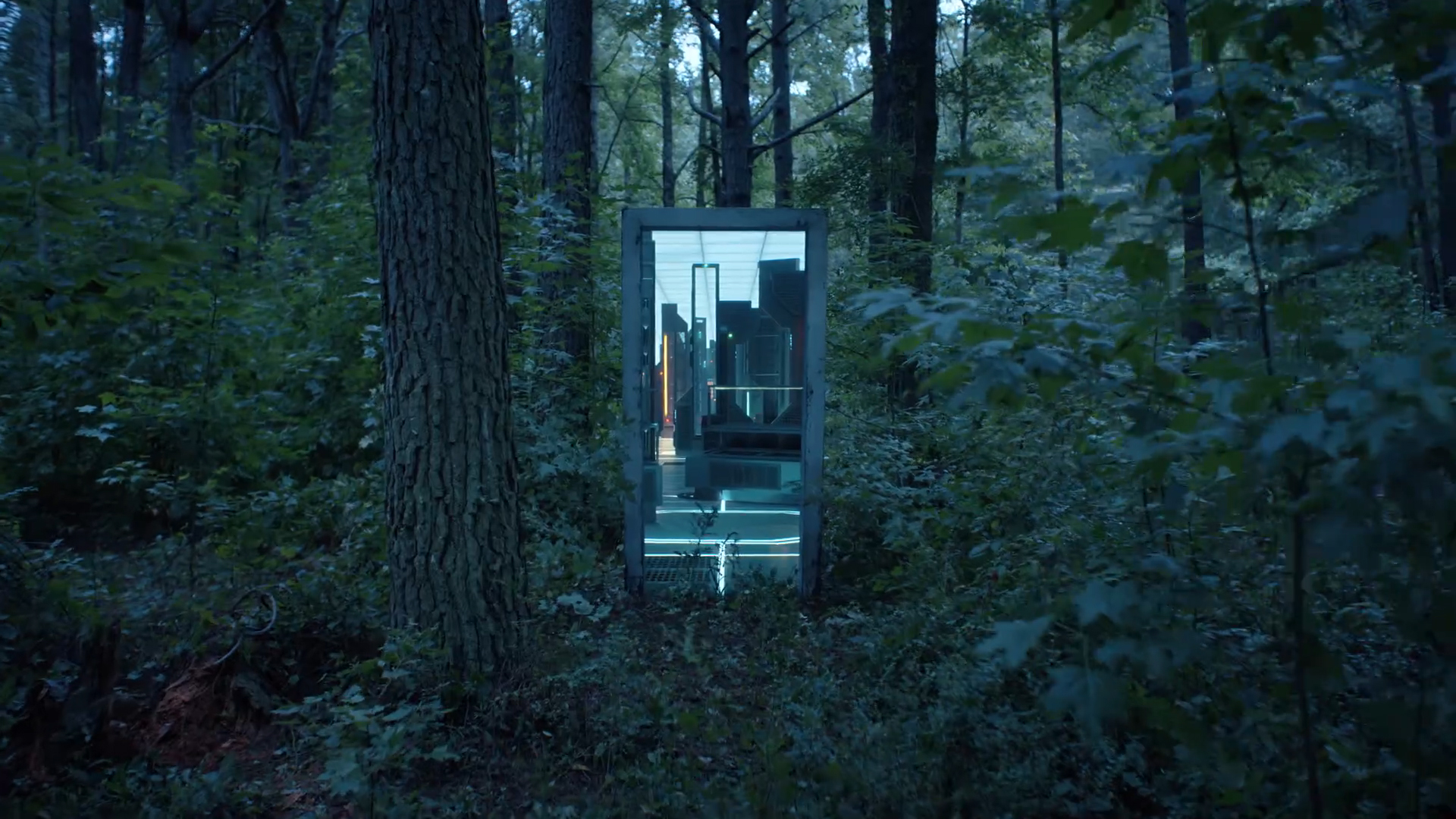 A doorway to the Quantum Unfolding Chamber in the middle of a forest in Peacemaker season 2 episode 4