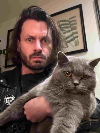 Green Lung’s Tom Templar with his cat Mervyn