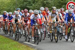 Nicole Cooke (Great Britain), World and Olympic road race champion, sits on the front of the bunch.