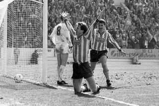 Coventry’s Keith Houchen celebrates with Micky Gynn (right) after scoring against Leeds