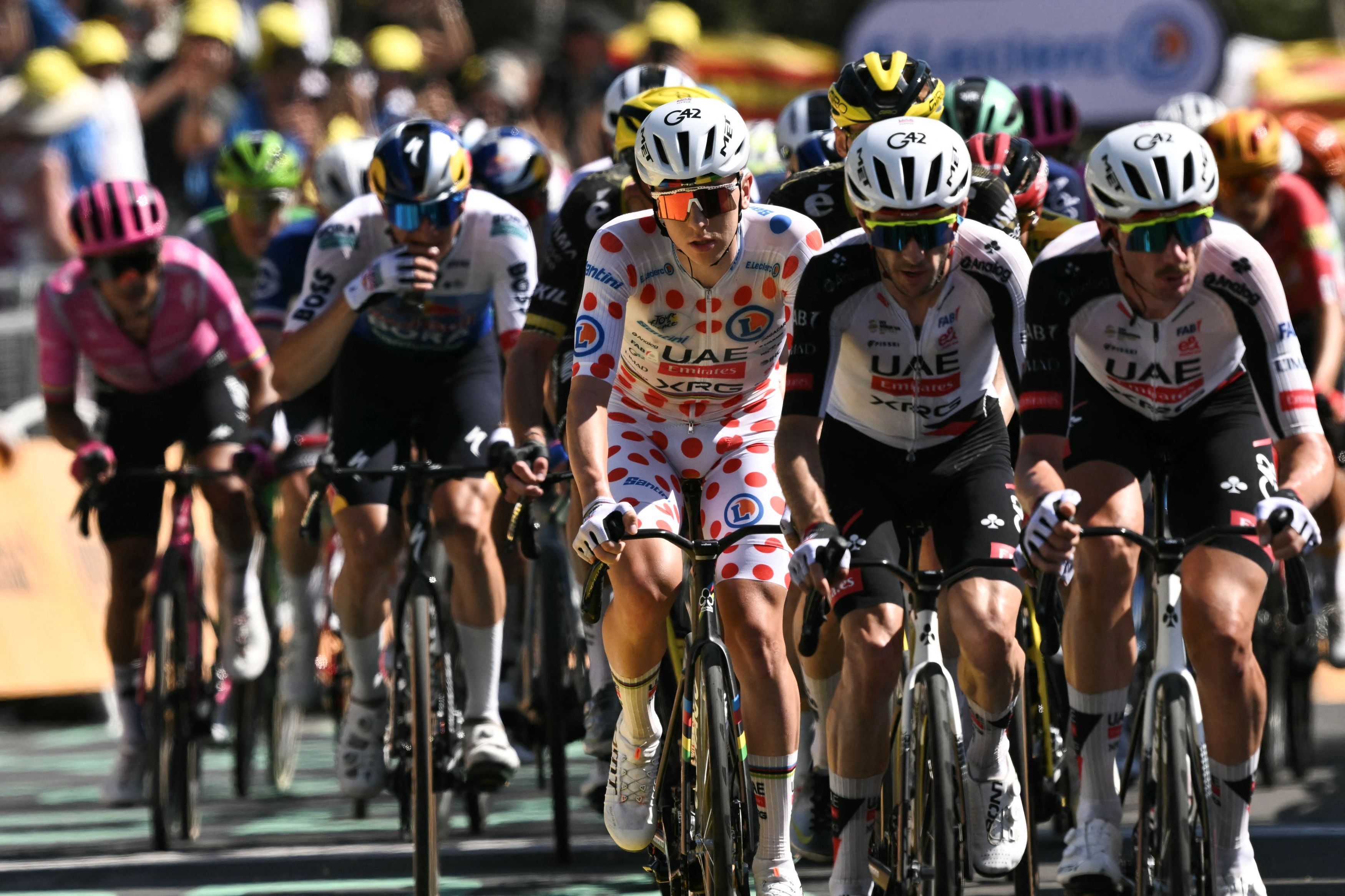 UAE Team Emirates - XRG's Slovenian rider Tadej Pogacar wearing the climber's dotted jersey cycles during the 2nd stage of the 113th edition of the Tour de France cycling race, 168,5 km between Tarragona and Barcelona in northeastern Spain, on July 5, 2026. (Photo by Jeff PACHOUD / AFP via Getty Images)