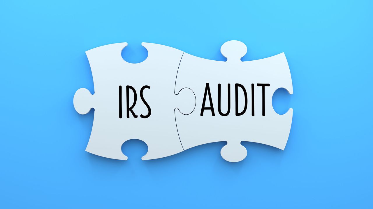 IRS and audit puzzle pieces for story about IRS agents