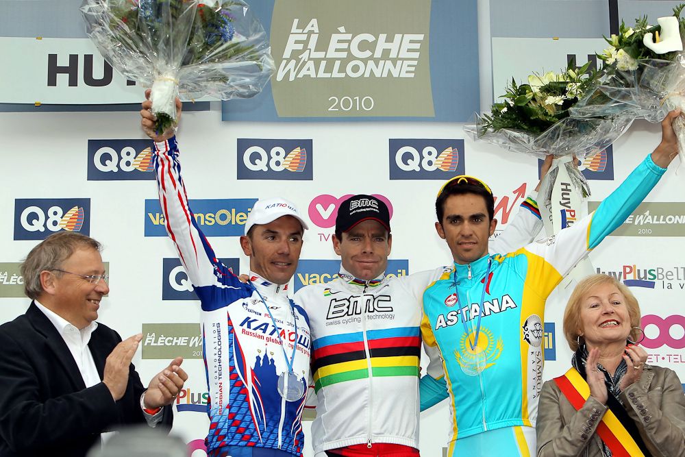 Joaquim Rodriguez of team Katusha, winner Cadel Evans of BMC Racing and third placed Alberto Contador of team Astana celebrate on the podium of the 2007 Fleche Wallonne.