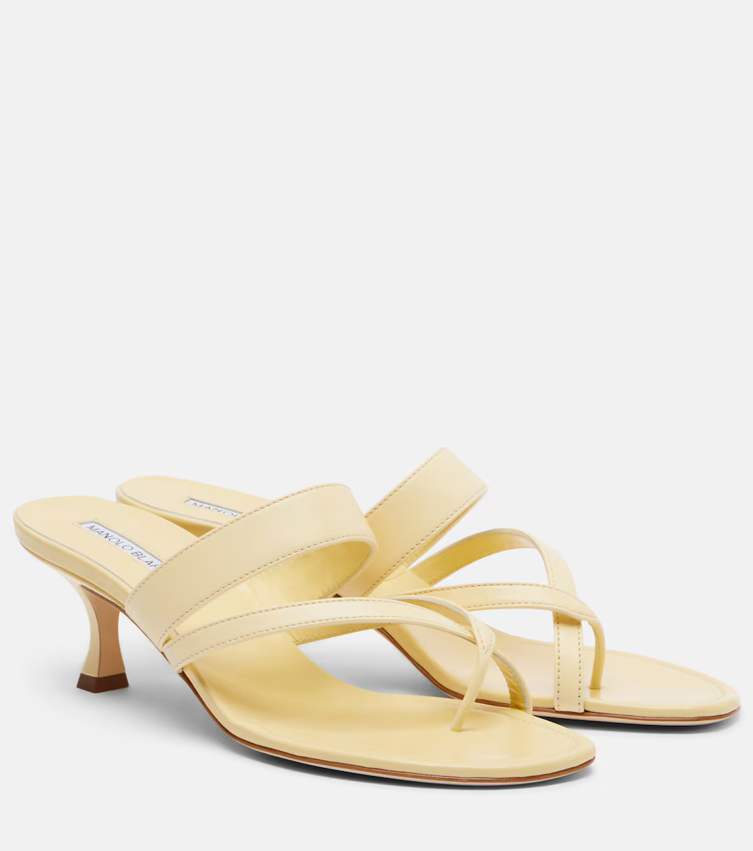 Manolo Blahnik yellow kitten heel sandals.