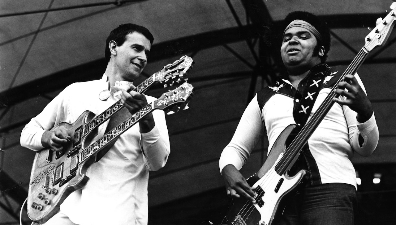 The Mahavishnu Orchestra perform live on stage in Amsterdam, Netherlands in 1973 L-R John McLaughlin, Ralphe Armstrong