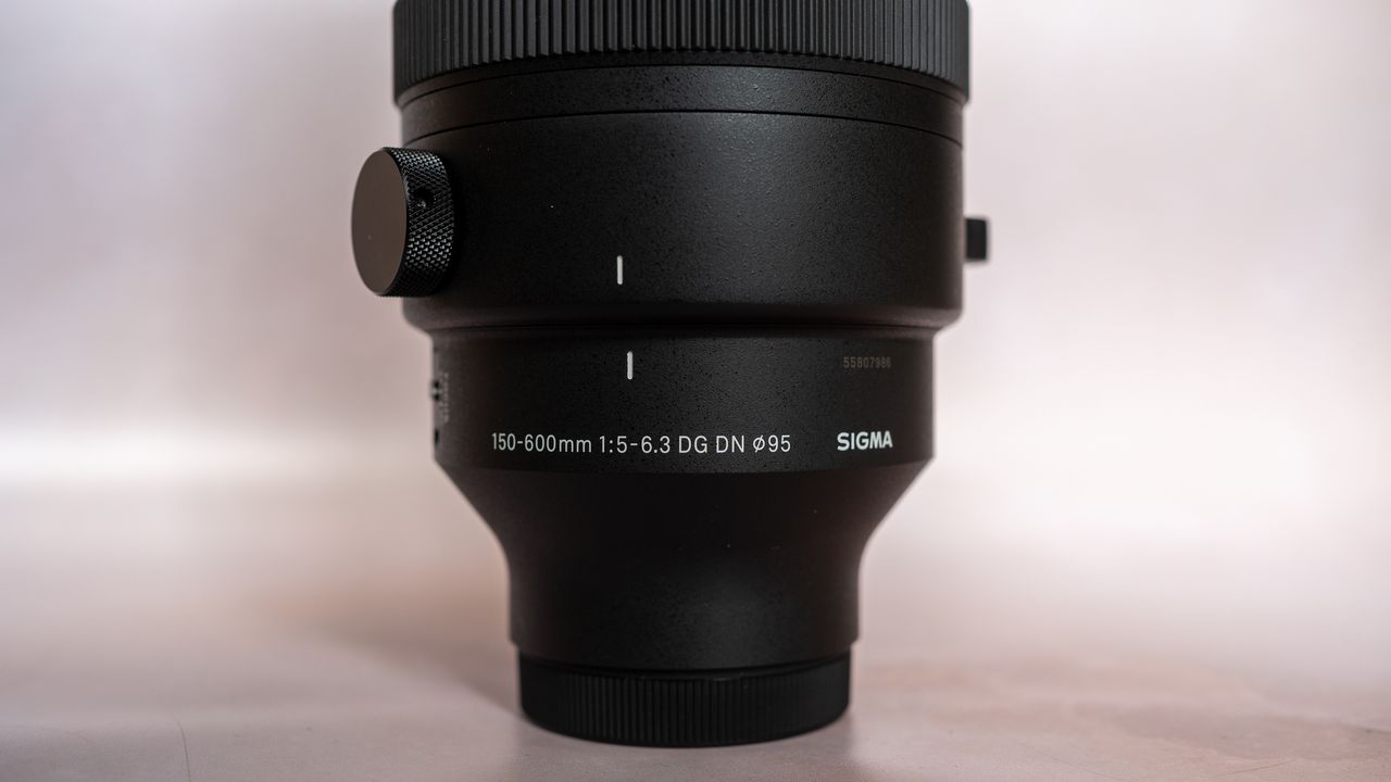 SIGMA 150-600mm f/5-6.3 DG DN OS lens on a plain background