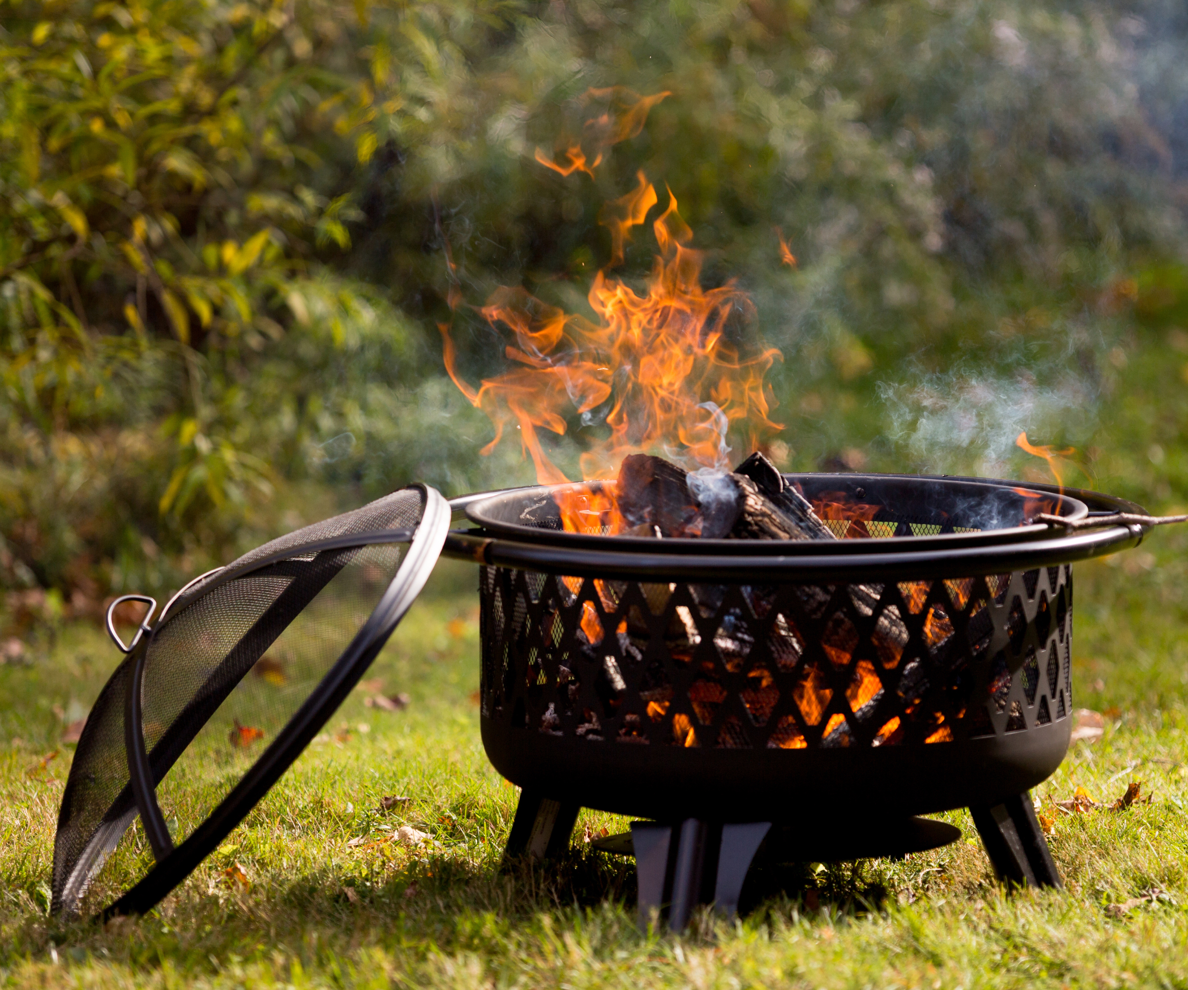 Fire pit burning in backyard