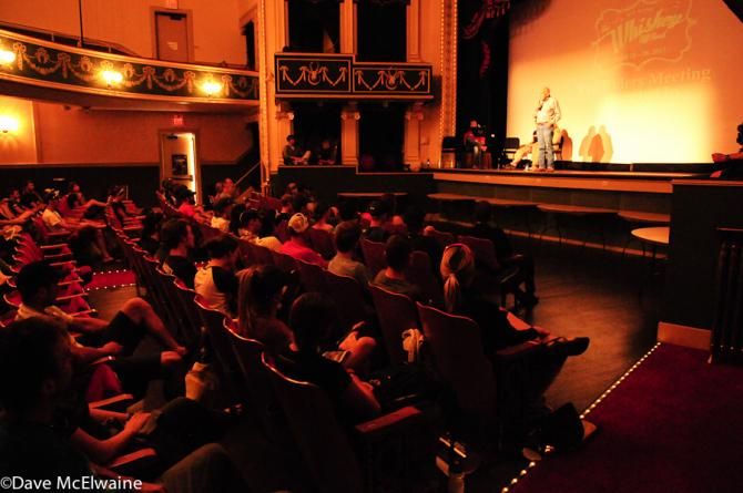 Pro racers receive race instructions in Prescott's historic Elk Theater