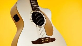 A close up of the body on a Fender California Newporter Player acoustic guitar