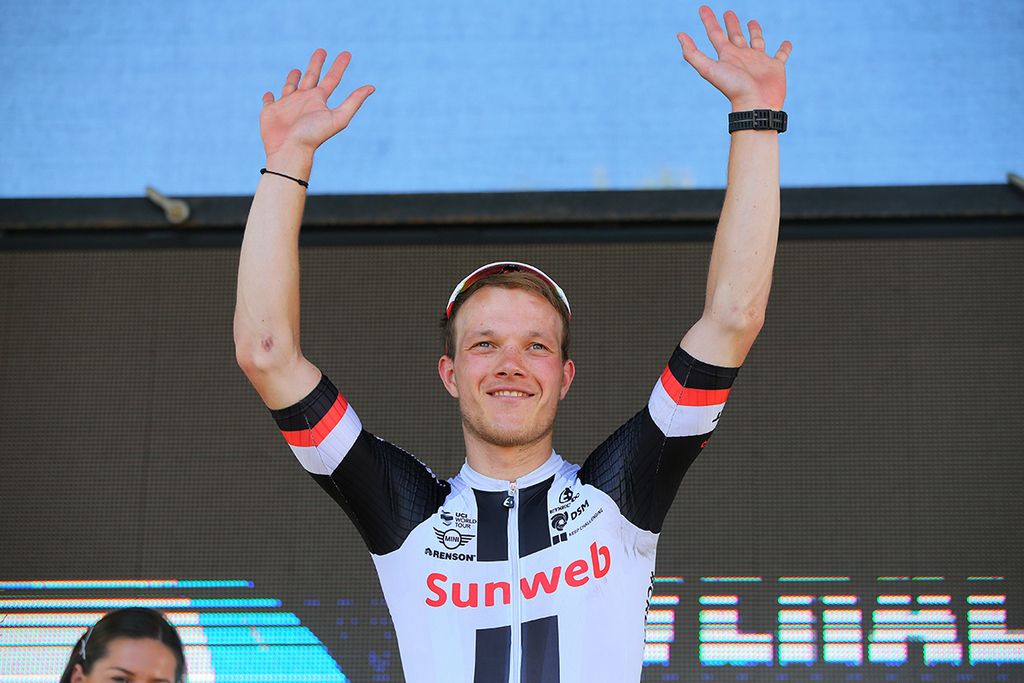 A smiling Nikias Arndt on the podium