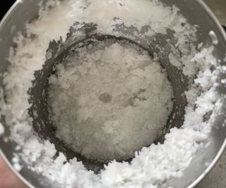 Coconut milk residue in the filter basket of the Almond Cow Milk Maker