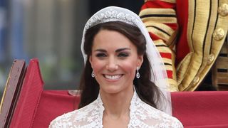 Duchess of Cambridge wearing half up half down hairstyles on her wedding day in 2011