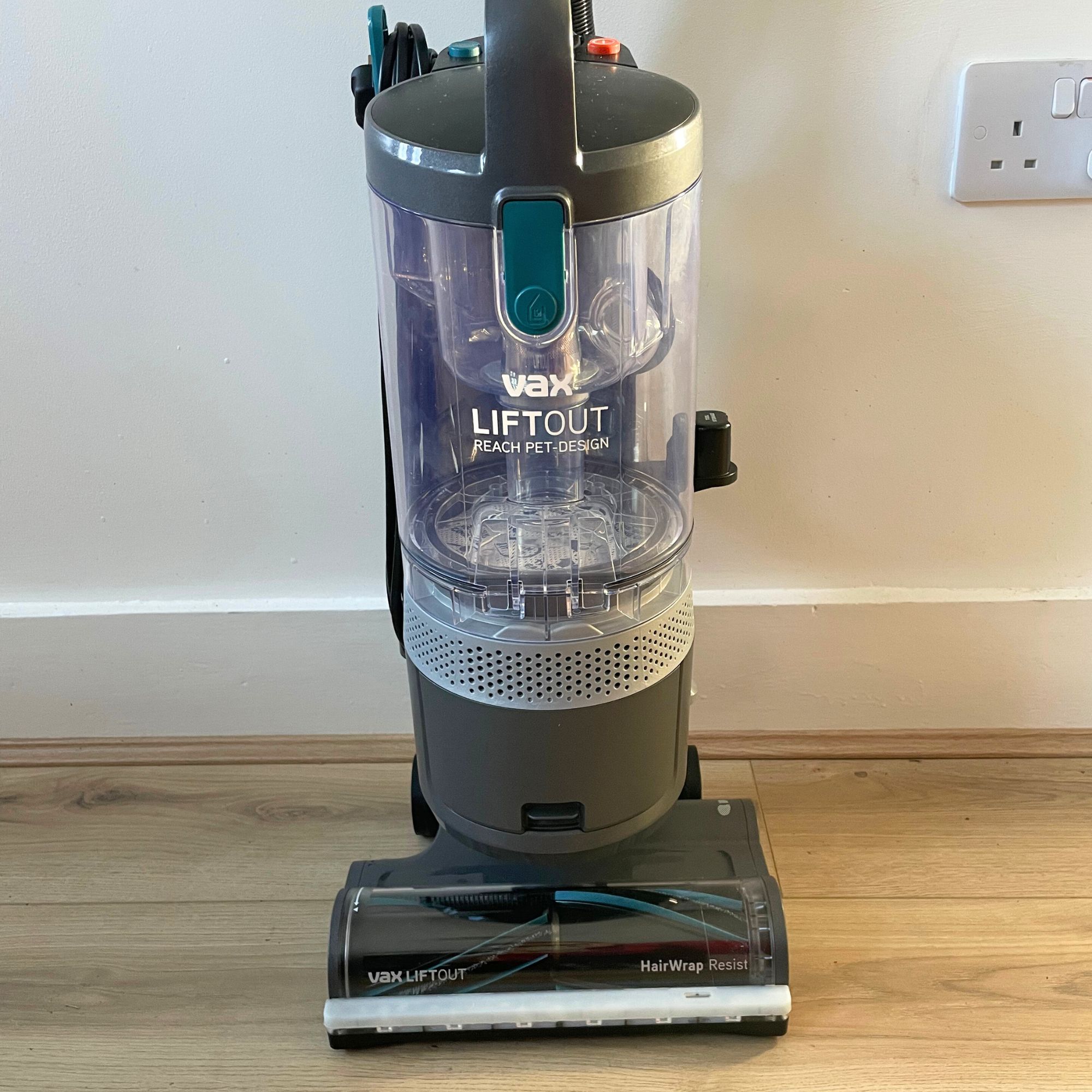Close up of the dust canister and floorhead of the Vax LiftOut Reach Pet Design Vacuum Cleaner