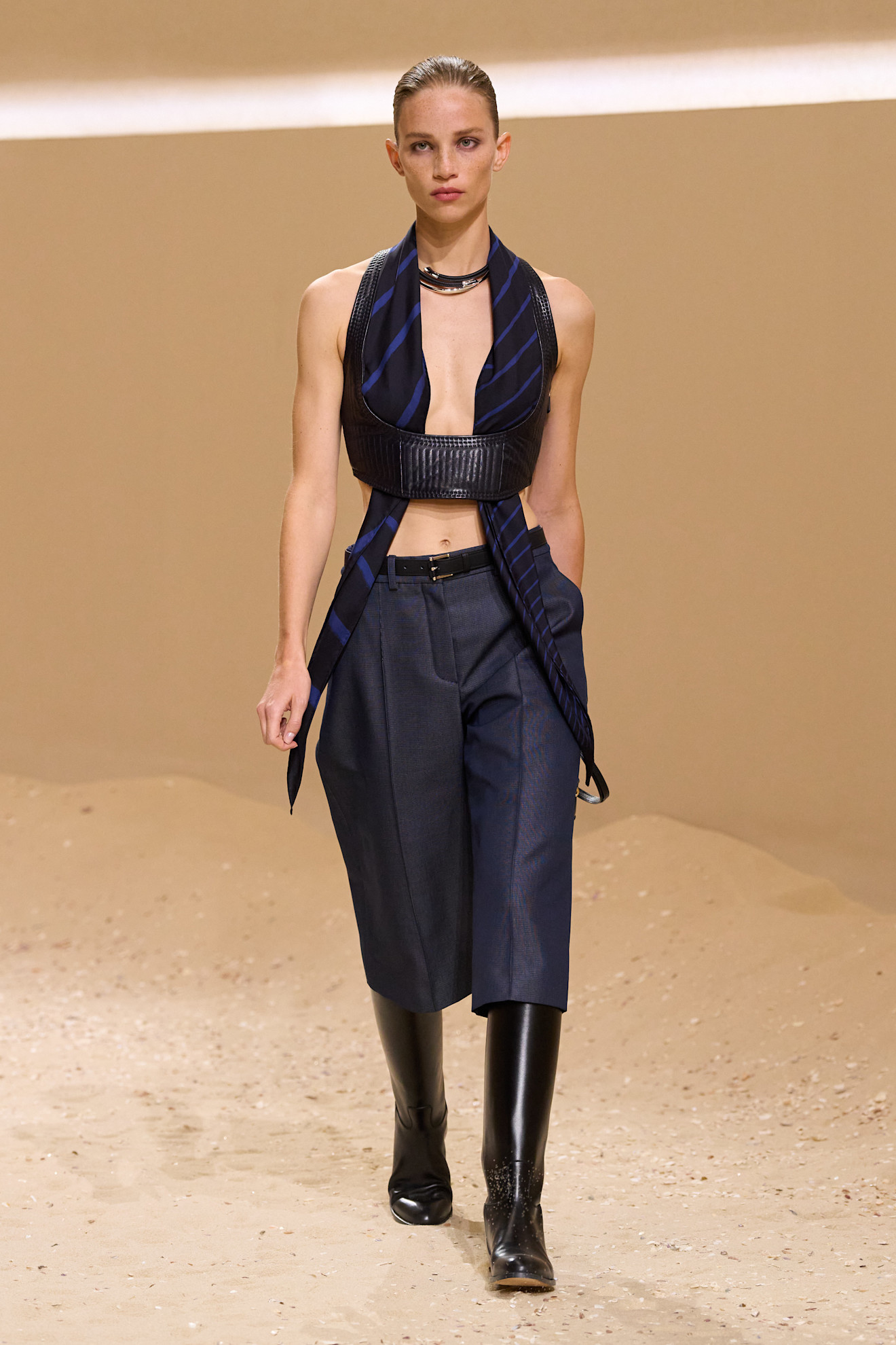 A model walks the hermes spring 2026 runway show in paris.