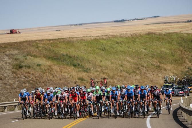 Riders come back out of the river valley and onto the plains.