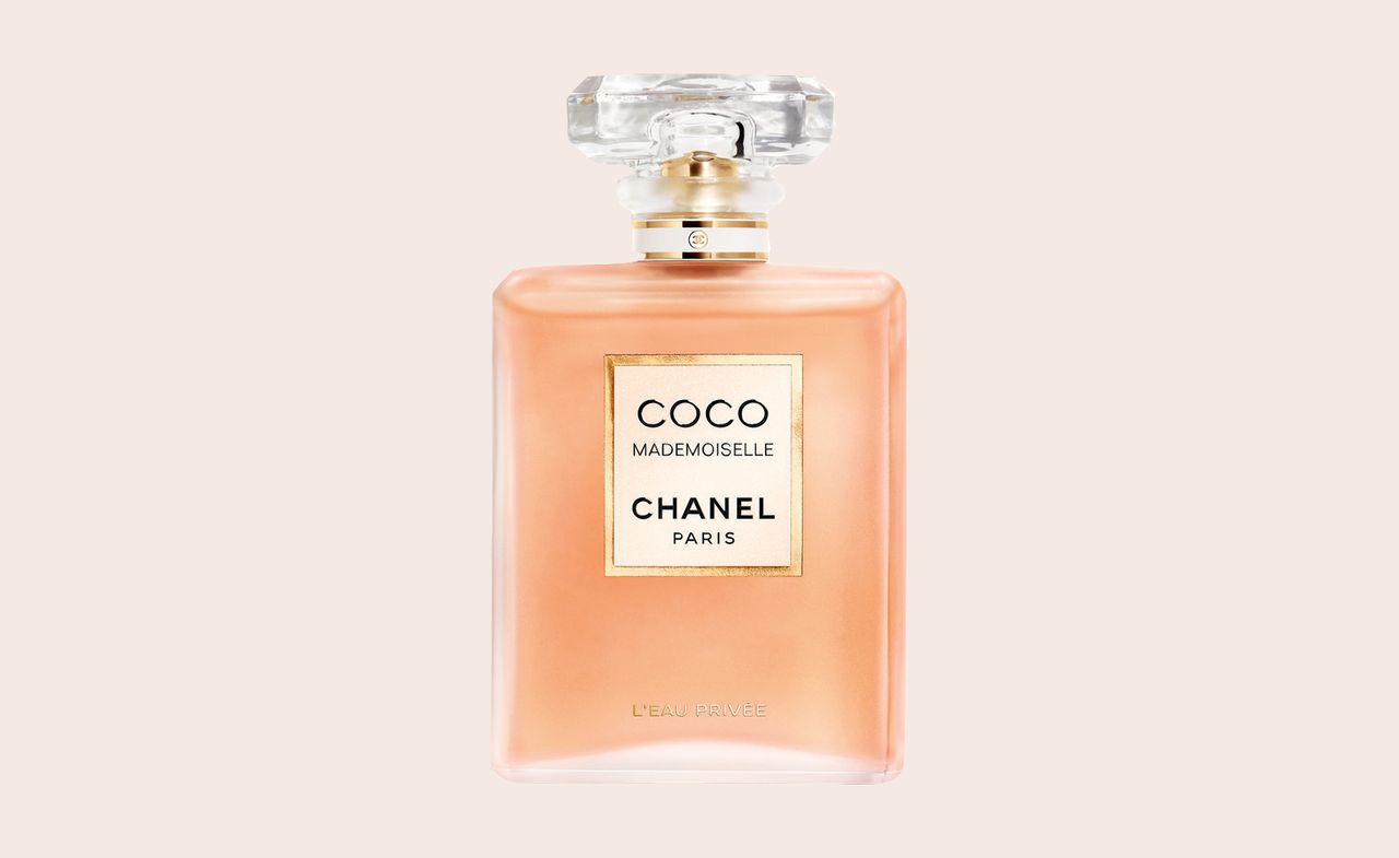 Chanel Sweet Dream&#039;s fragrance. Pink bottle with a round clear lid.