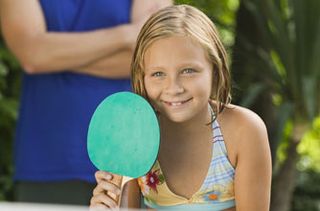 girl playing table tennis