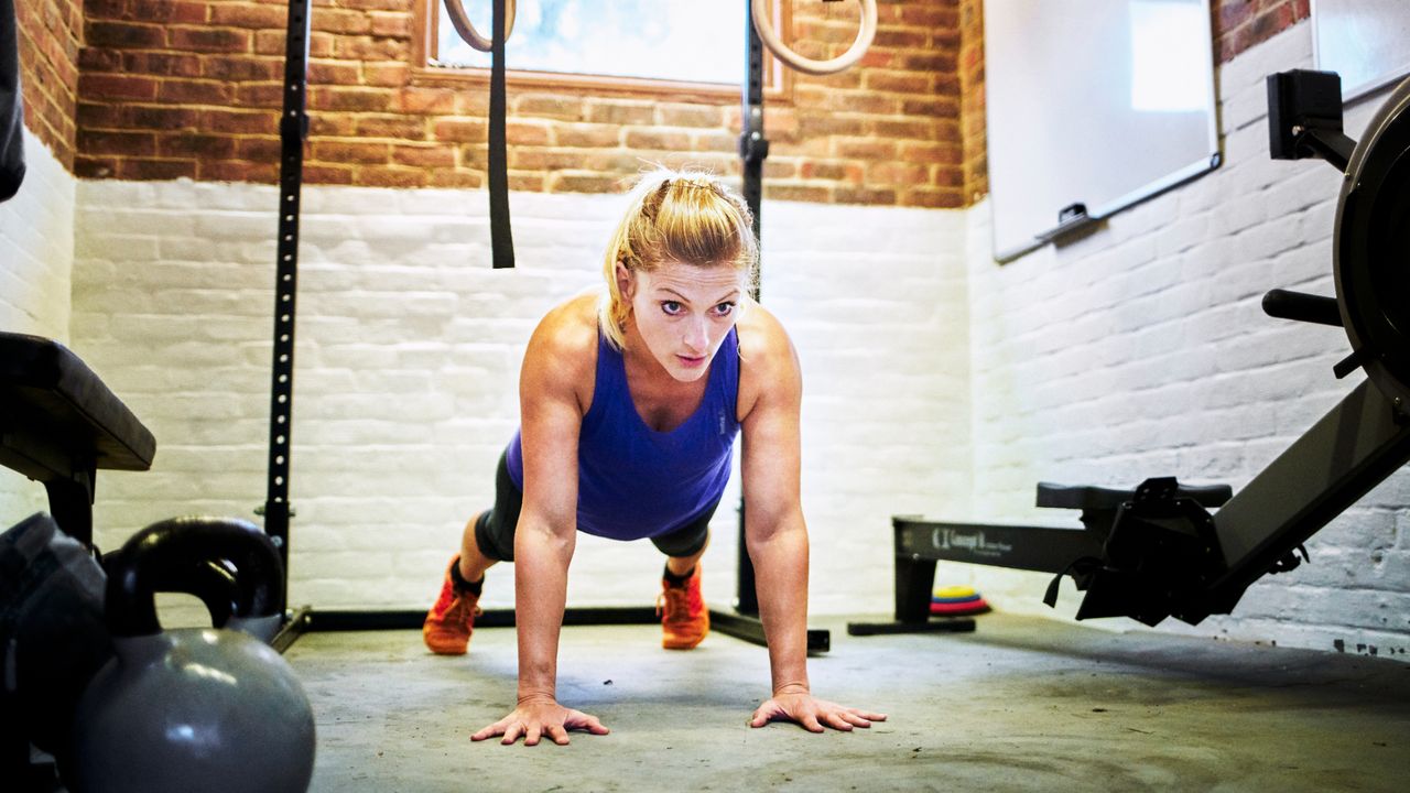 Woman training in a home gym