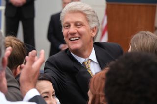 TV tonight President Clinton (Clive Owen) maintains a smiling facade…