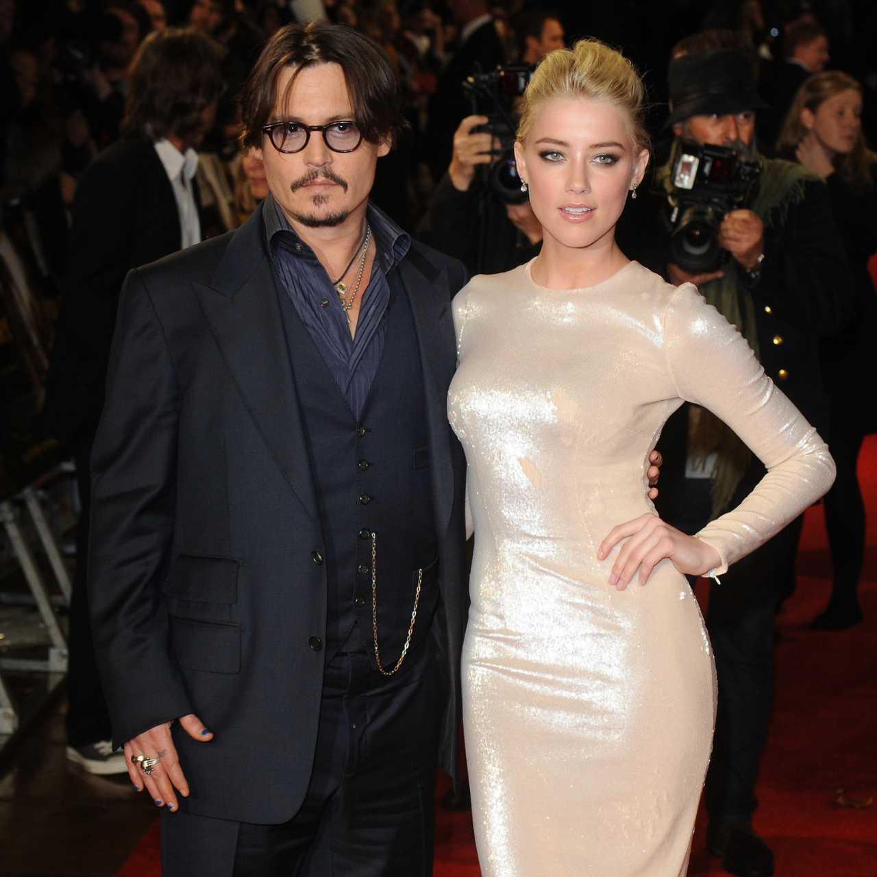 Johnny Depp and Amber Heard attend the 2011 premiere of Rum Diary