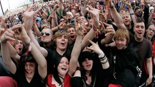 Download festival crowd throwing horns