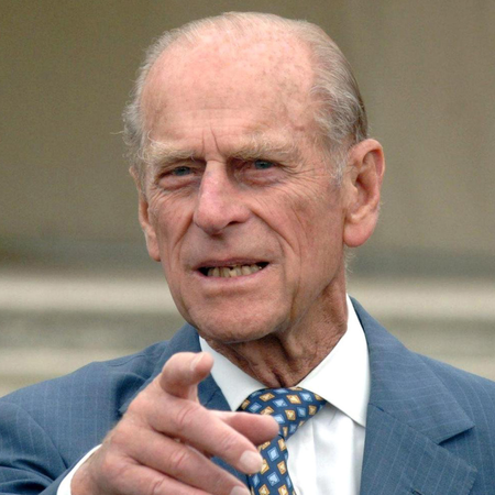 Prince Philip points at the camera while he meets guests in the gardens of Buckingham Palace to celebrate the 50th anniversary of the Duke of Edinburgh's Award scheme on July 13, 2006