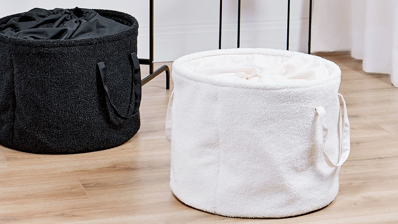 White and black boucle storage baskets in room