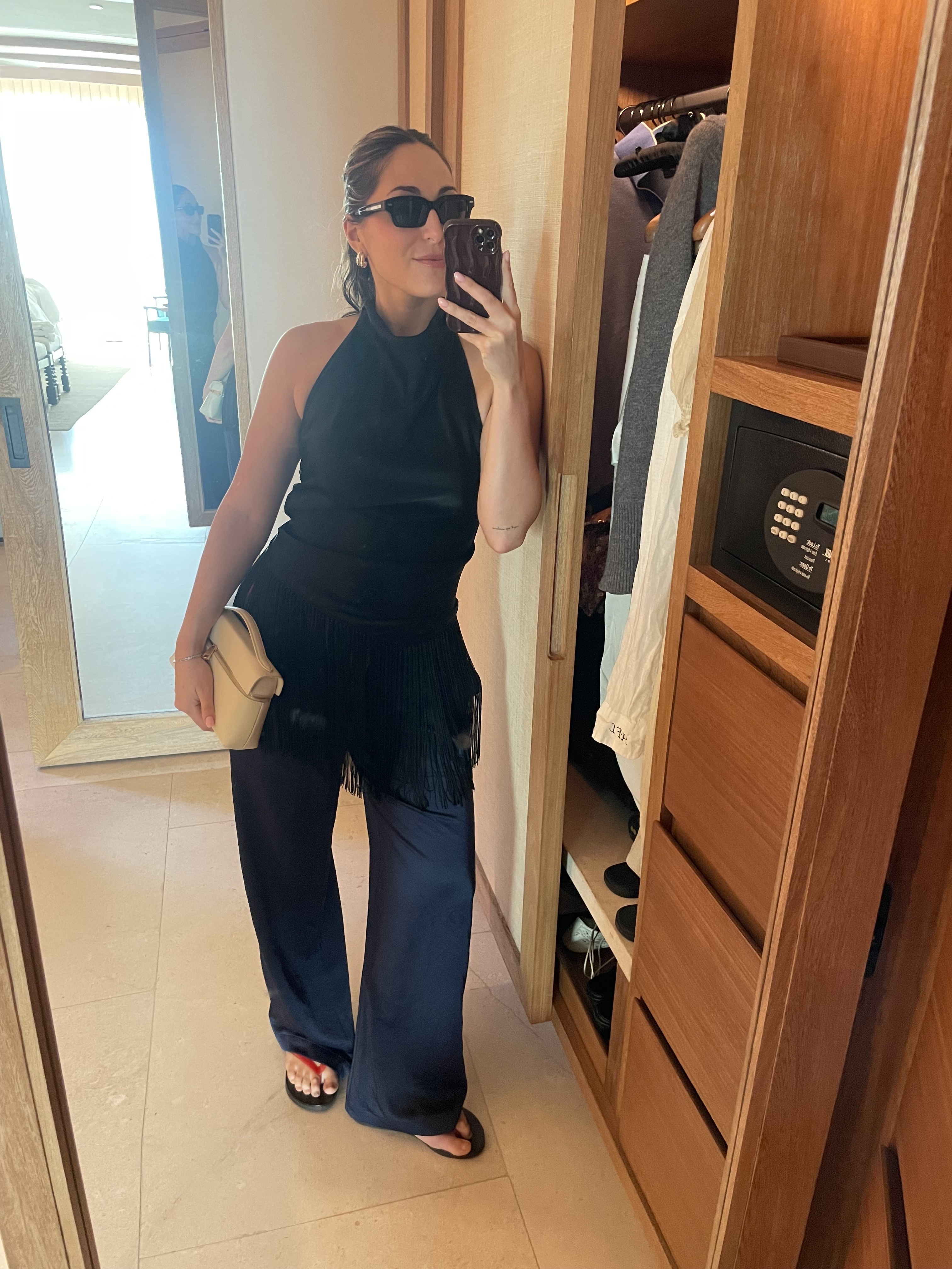 Anna LaPlaca wearing travel-friendly pants that aren't leggings but aren't jeans