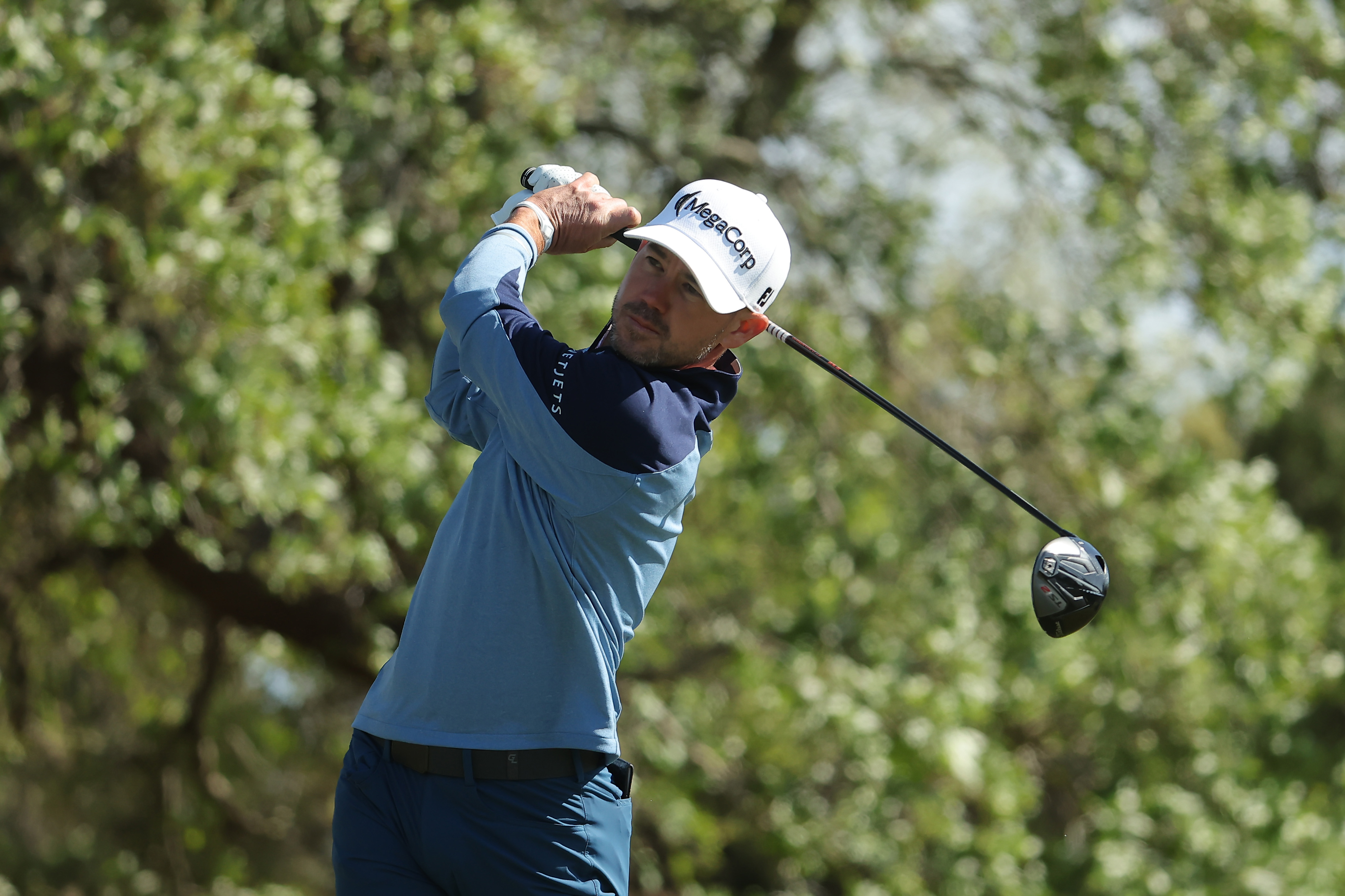 Brian Harman hits a driver off the tee