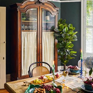 Christmas dining room with table and armoire