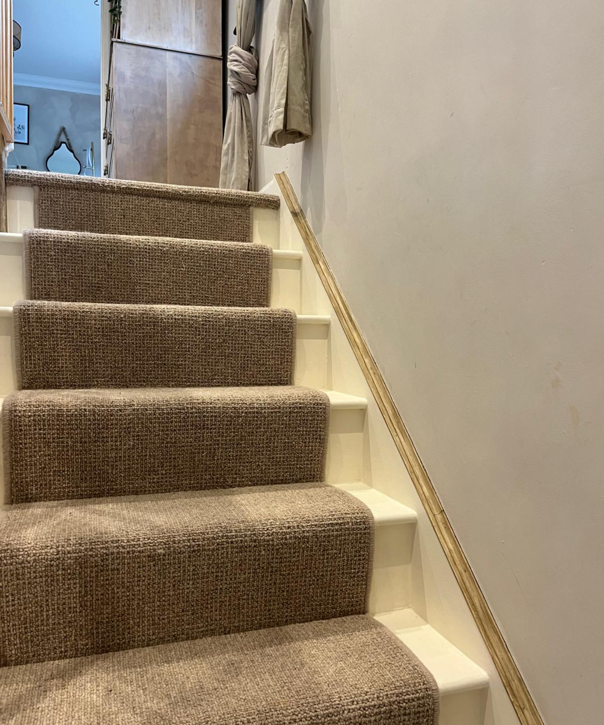 before and after of stairs being painted
