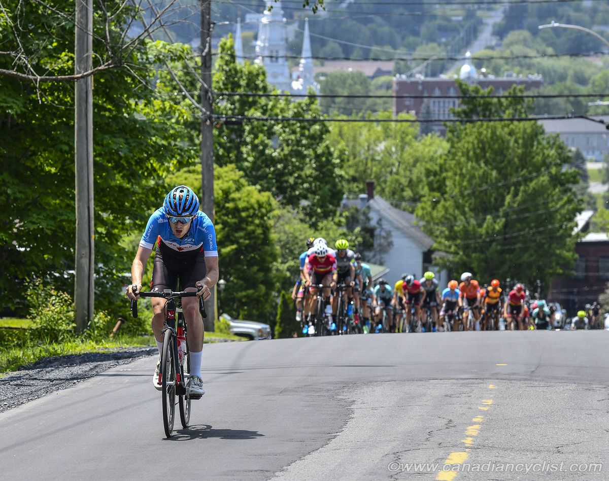 Derek Gee (Team Canada) tries to bridge across to the leaders